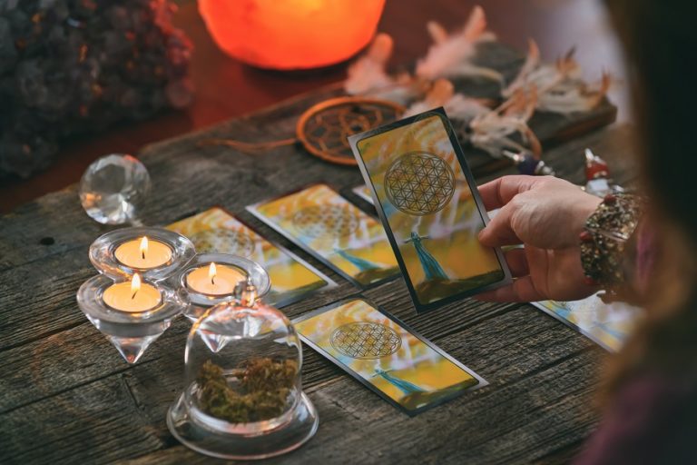 Woman,Holds,Tarot,Cards,In,Her,Hands.,Concept,Of,Psychic